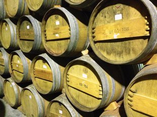 Barrels stacked similarly to the solera aging system.