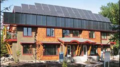 Figures 10 — The Riverdale NetZero Project, an EQuilibrium™ demonstration duplex in Edmonton, Alberta has a PV racking system that extends beyond the roof
