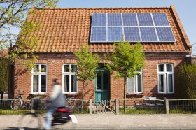Little Traditional northern Brick house with solar panels