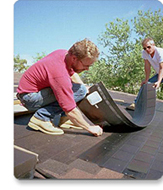 Photovoltaic (solar cell) Systems: Solar shingles are installed on a rooftop.